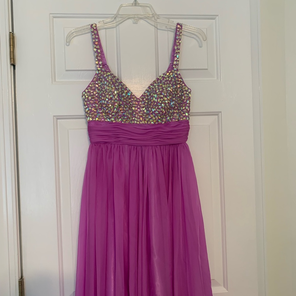 Size 0. Worn once long formal dress!